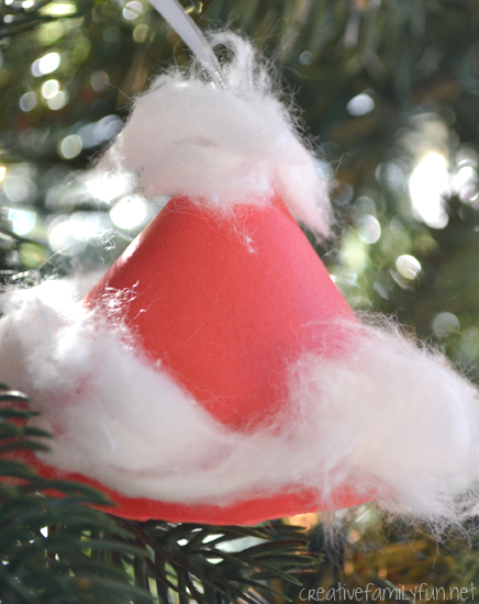 Make a simple Santa Hat Ornament to hang on your Christmas tree this year when you create this simple Christmas craft for kids.