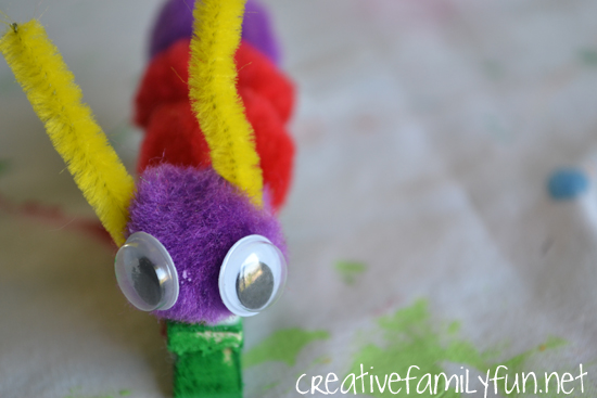 Grab some simple craft supplies to make this fun classic craft with your kids, Pom pom Caterpillar. It's so easy to make and looks so cute on it simple paper leaf.
