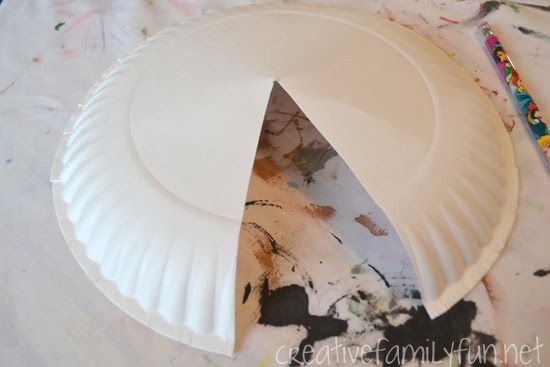 This fun candy corn craft is a fun and non-spooky decorations that kids can make. So, grab some supplies to make this awesome paper plate sculpture.