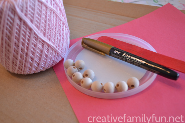 Make a fun craft for Chinese New Year or any time you're learning about China when you make this Chinese Rattle Drum craft for kids.