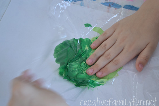 Try some fun smoosh painting to create this pretty St. Patrick's Day craft for kids. The process is fun and the results are pretty with this sensory painting idea.