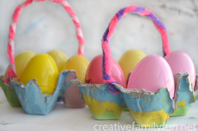 This simple Egg Carton Easter Basket craft for kids makes a fun and pretty little container to hold your plastic eggs or dyed Easter Eggs.