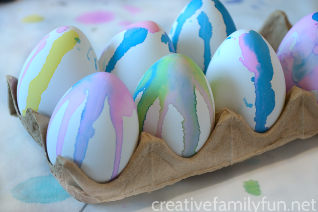 Decorate your Easter eggs this year with a fun twist on classic egg dying. This Easter Egg Dye Pour Painting is so much fun and results in pretty striped Easter Eggs.