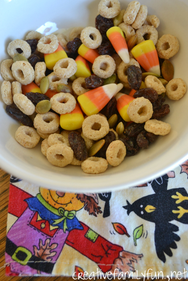 Make a simple and delicious Candy Corn Snack Mix to pair with a fun Halloween book. It's a great snack that kids can make themselves.
