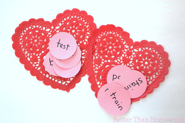 Get out paper doilies to help practice word families with a fun Valentine Word Family Game. It's a fun Valentine reading game.