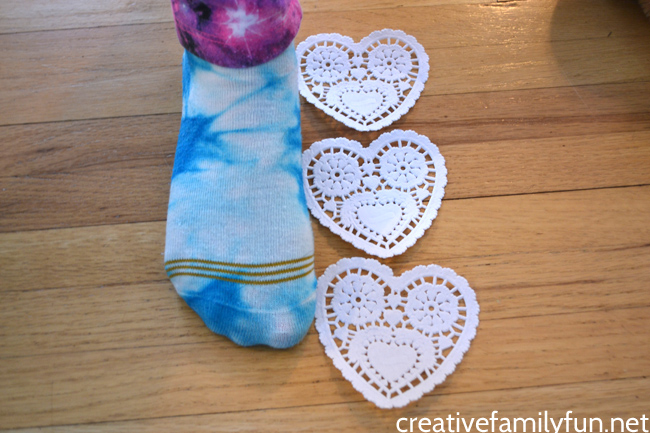 Use heart doilies for a fun hands-on way to practice measuring with this fun Valentine Nonstandard Measurement activity for kids.